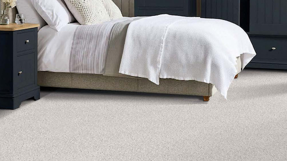 beautiful neutral textured carpet in a bedroom