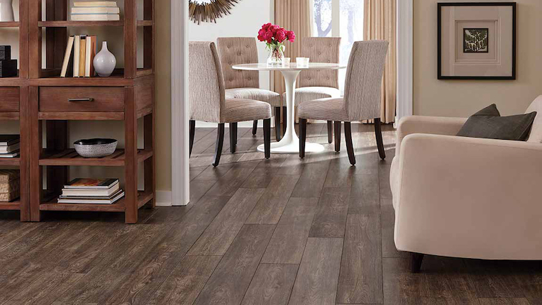 wood look laminate flooring in a living and dining room area